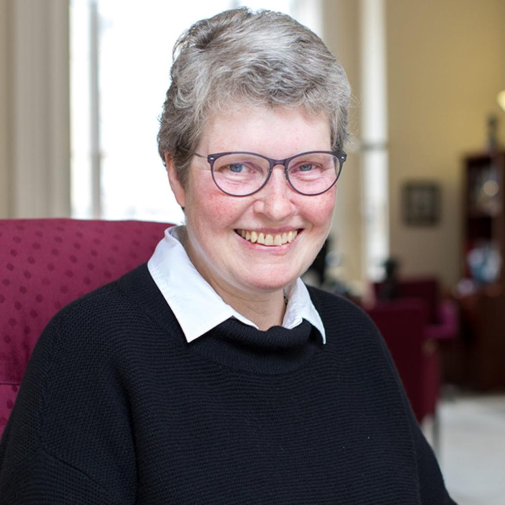 Smiling woman in black sweater